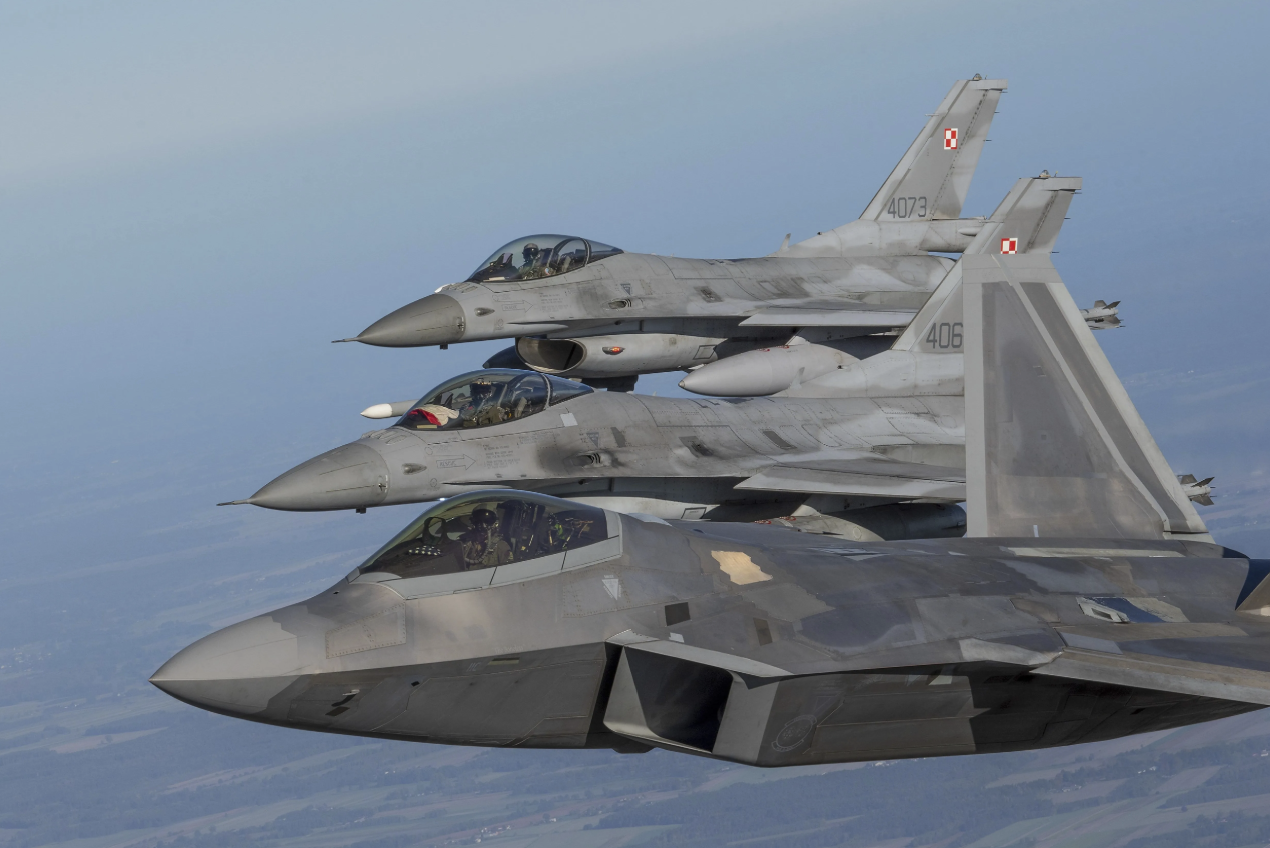 3 fighter jets in the air